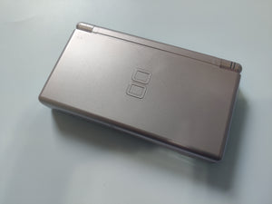 Nintendo DS Lite Rose Gold Console with Authentic Charger - All-in-One Gaming System for a Stylish and Portable Experience