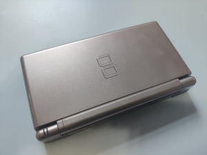 Nintendo DS Lite Rose Gold Console with Authentic Charger - All-in-One Gaming System for a Stylish and Portable Experience
